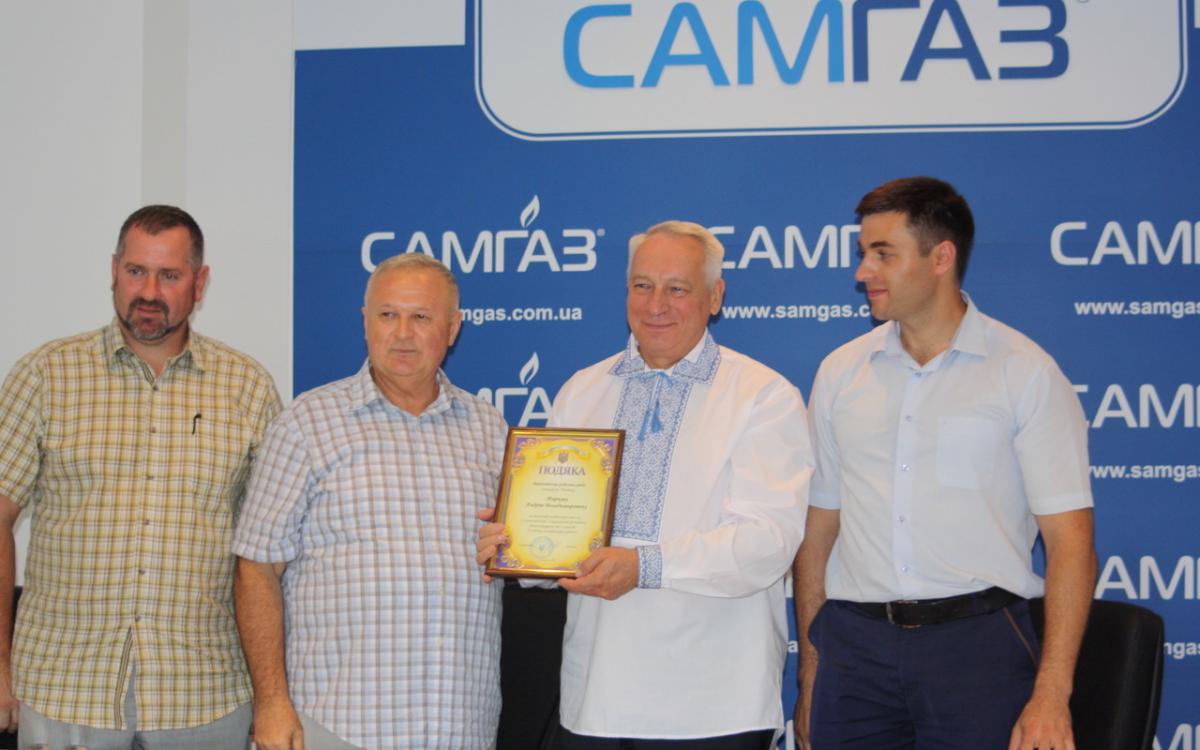 Андрій Марков отримав почесну грамоту і пам’ятну монету в присутності трудового колективу ТОВ «Самгаз»  від представників газопостачальної компанії ПАТ «Рівнегаз»